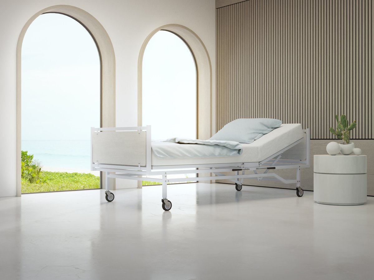 Modern wellness space showcasing elegant heated loungers and sauna entrance, illuminated by soothing ambient blue lighting, evoking calm and relaxation.